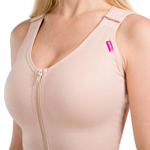 Post-operative female upper body sleeveless compression bodysuit beige
